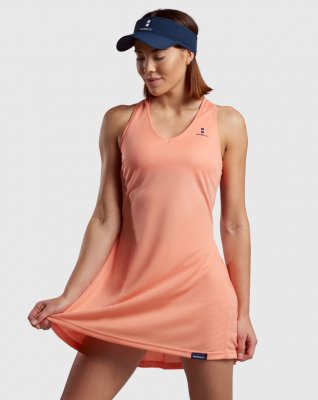 köp en korallfärgad tennisklänning padelklänning